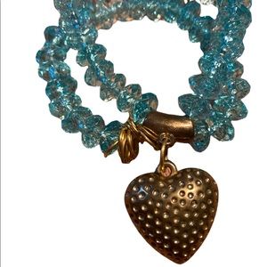 Two Strand single clasp gold beaded charm bracelet